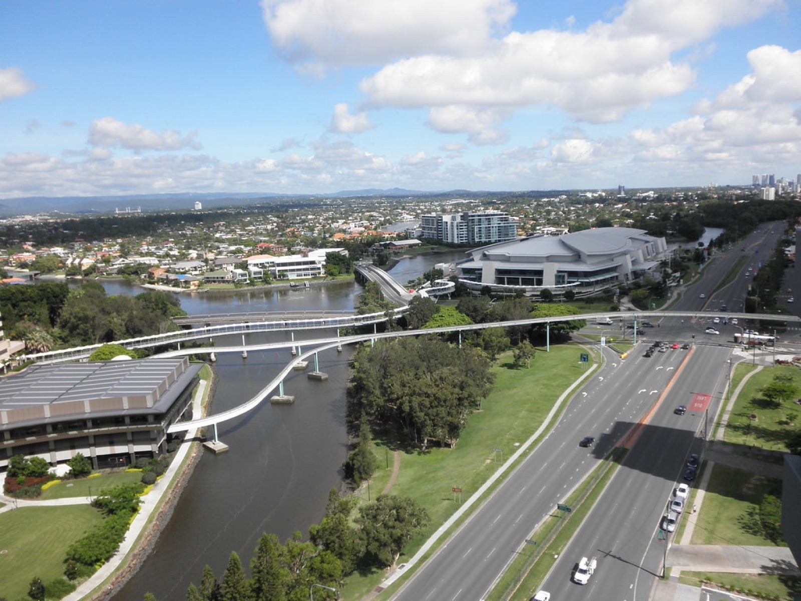 View over city roads and buildings from a high floor